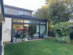 Fabrication et pose d'une véranda sur-mesure en aluminium à Saint-Sulpice-et-Cameyrac (33)